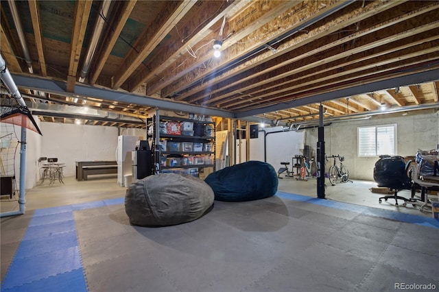 8721 E 23rd Ave, Denver, CO 80238 - basement featuring freestanding refrigerator and heating fuel
