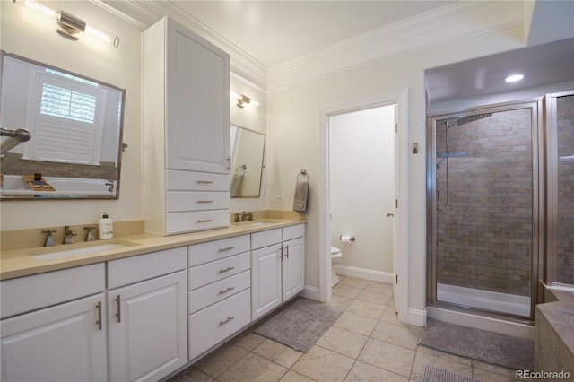 8721 E 23rd Ave, Denver, CO 80238 - bathroom featuring double vanity, a shower stall, ornamental molding, and tile patterned floors