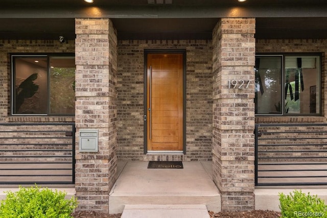 1927 S Grant St, Denver, CO 80210 - property entrance with brick siding