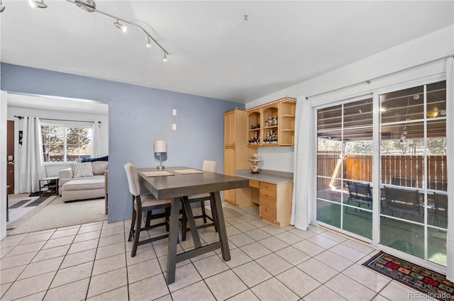 dining room featuring light tile patterned floors