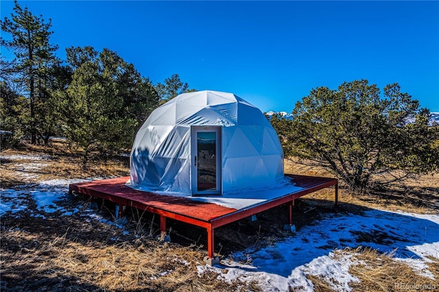 exterior space featuring an exterior structure