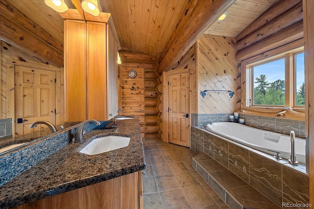 full bathroom with wooden ceiling, rustic walls, a garden tub, and vanity