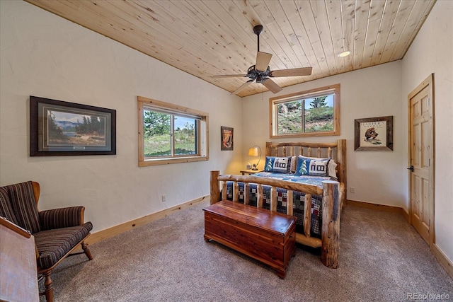 bedroom with carpet floors, wooden ceiling, a ceiling fan, and baseboards
