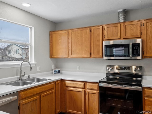 kitchen with sink and stainless steel appliances