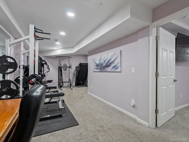 workout area with light colored carpet