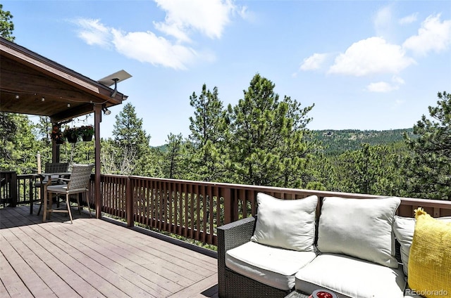 7221 S Brook Forest Rd, Evergreen, CO 80439 - deck featuring a view of trees