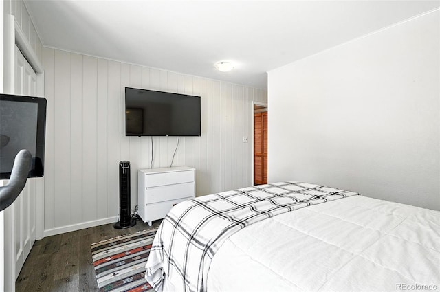 7221 S Brook Forest Rd, Evergreen, CO 80439 - bedroom with dark wood-style flooring