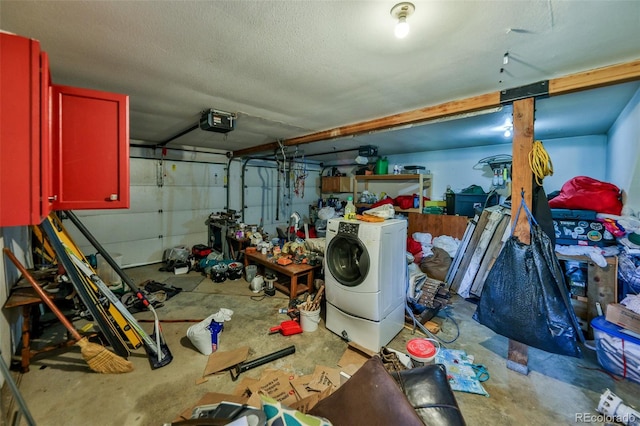 garage featuring washer / clothes dryer and a garage door opener