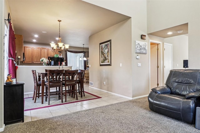 14389 E 101st Pl, Commerce City, CO 80022 - dining space featuring a chandelier, light tile patterned floors, baseboards, and recessed lighting