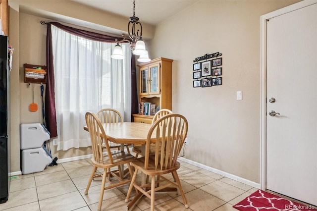 14389 E 101st Pl, Commerce City, CO 80022 - dining room featuring light tile patterned floors and baseboards