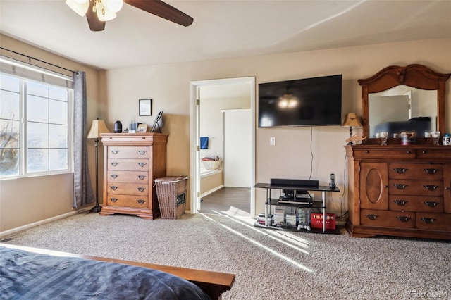 carpeted bedroom featuring ceiling fan and multiple windows