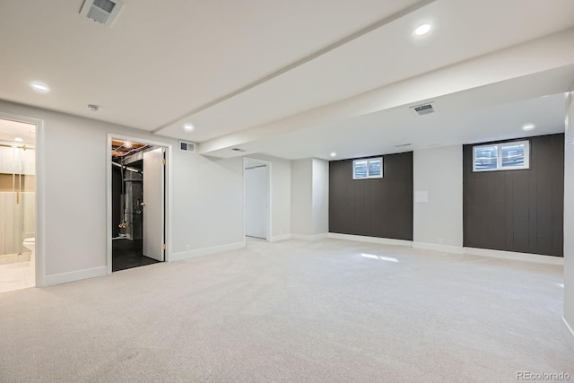 1040 Grove St, Denver, CO 80204 - basement featuring visible vents, recessed lighting, and light colored carpet