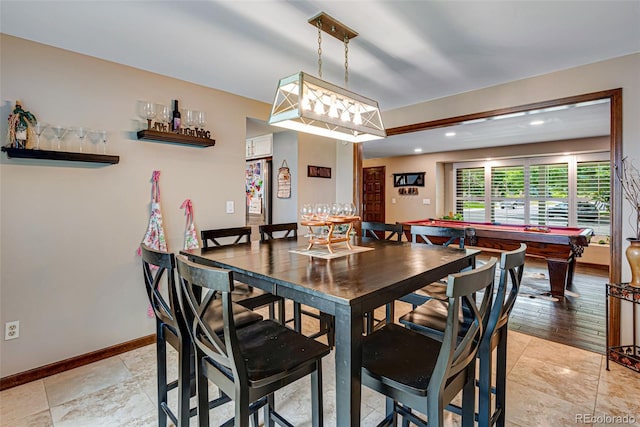 tiled dining room featuring pool table