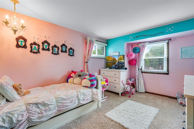 bedroom with light carpet, a notable chandelier, and multiple windows