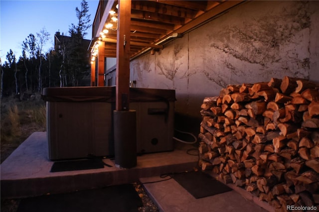 exterior space featuring a hot tub