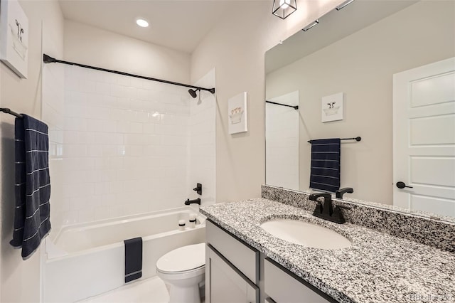 full bathroom featuring toilet, vanity, recessed lighting, and shower / tub combination