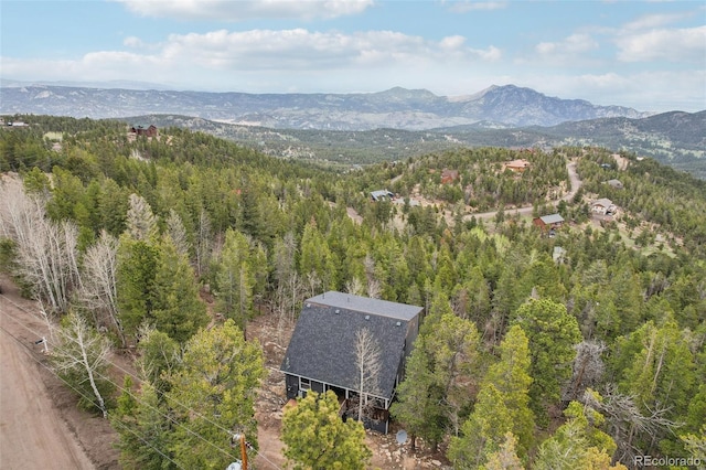 11390 Shimley Rd, Golden, CO 80403 - aerial view of mountains and a heavily wooded area