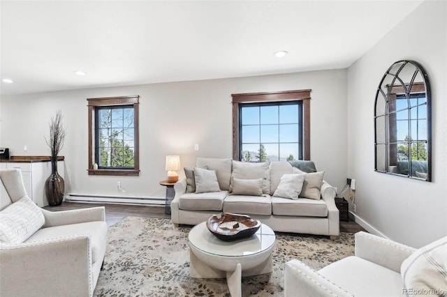 11390 Shimley Rd, Golden, CO 80403 - living area with a baseboard radiator, wood finished floors, healthy amount of natural light, recessed lighting, and baseboards