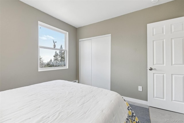 11390 Shimley Rd, Golden, CO 80403 - carpeted bedroom featuring baseboards and a closet