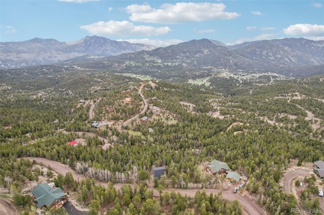 11390 Shimley Rd, Golden, CO 80403 - aerial view of property and surrounding area with a mountain backdrop and a forest