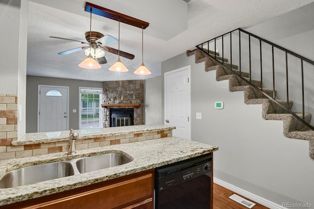 3619 Queen Anne Way, Colorado Springs, CO 80917 - kitchen featuring black dishwasher, a sink, a textured ceiling, ceiling fan, and dark wood-style floors