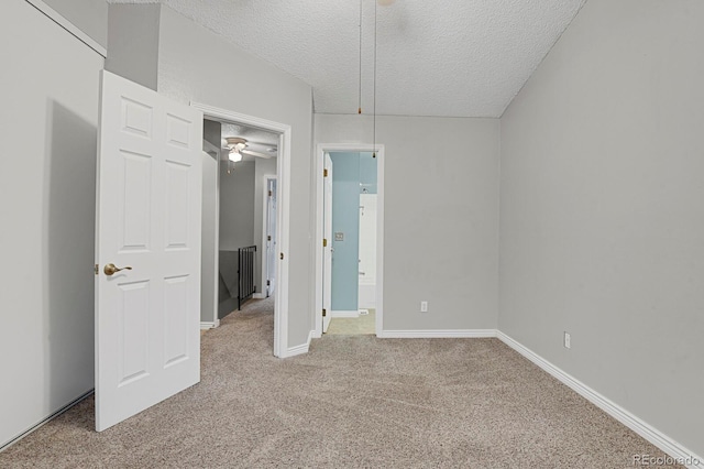 3619 Queen Anne Way, Colorado Springs, CO 80917 - unfurnished bedroom featuring carpet floors, a textured ceiling, baseboards, and ensuite bathroom
