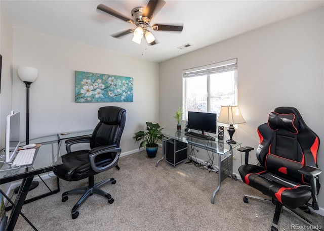 office area with carpet floors and ceiling fan