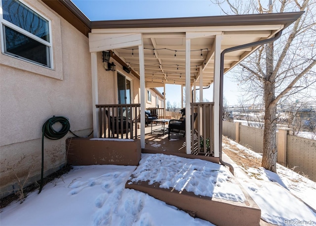 view of snow covered patio