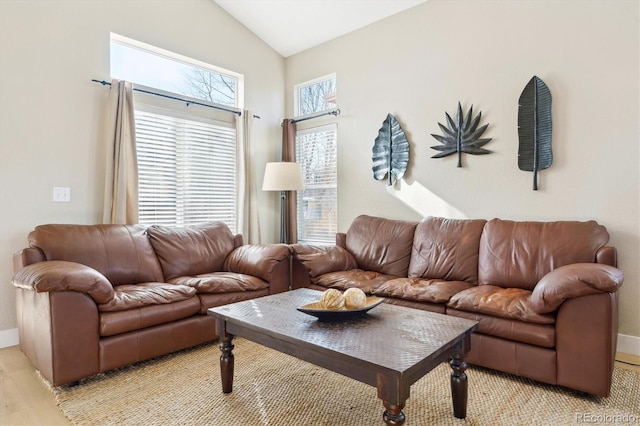 living room with vaulted ceiling