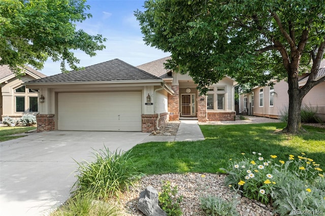 15876 Double Eagle Dr, Morrison, CO 80465 - view of front facade with a garage, brick siding, a front yard, driveway, and a shingled roof