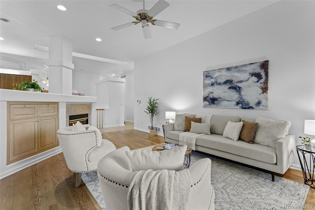 15876 Double Eagle Dr, Morrison, CO 80465 - living room with recessed lighting, ceiling fan, light wood-style flooring, and a fireplace