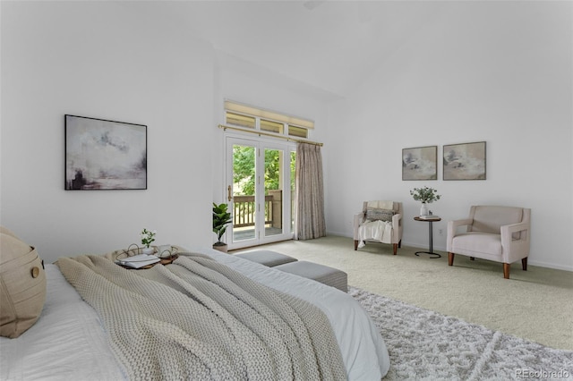 15876 Double Eagle Dr, Morrison, CO 80465 - carpeted bedroom with access to outside and high vaulted ceiling