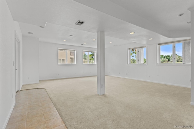 15876 Double Eagle Dr, Morrison, CO 80465 - spare room featuring light colored carpet, recessed lighting, and light tile patterned floors