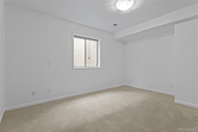 15876 Double Eagle Dr, Morrison, CO 80465 - spare room featuring light carpet and baseboards