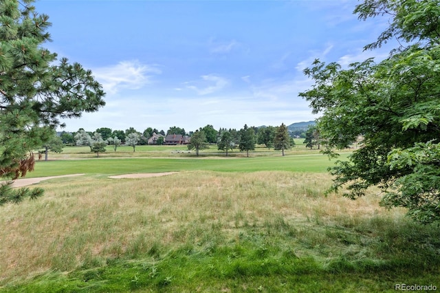 15876 Double Eagle Dr, Morrison, CO 80465 - view of home's community featuring a lawn and a mountain view