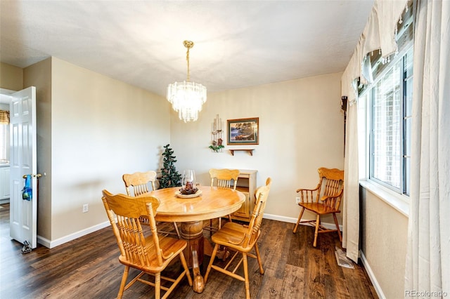 41020 US Highway 36, Bennett, CO 80102 - dining room featuring dark wood finished floors and a chandelier