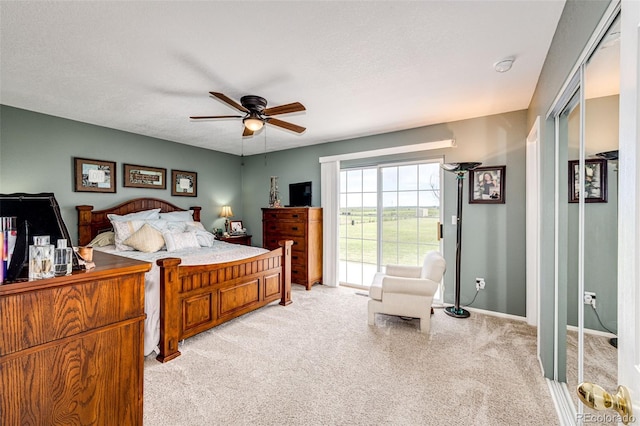 41020 US Highway 36, Bennett, CO 80102 - bedroom featuring light carpet, access to exterior, and ceiling fan