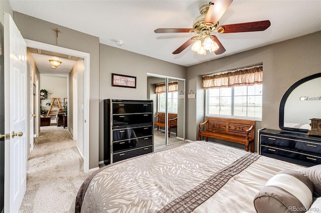 41020 US Highway 36, Bennett, CO 80102 - carpeted bedroom with a closet, attic access, and a ceiling fan