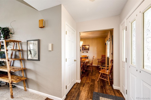 41020 US Highway 36, Bennett, CO 80102 - entrance foyer featuring dark wood-style flooring and baseboards