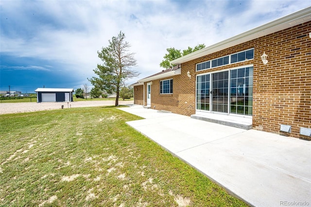 41020 US Highway 36, Bennett, CO 80102 - view of grassy yard featuring a patio