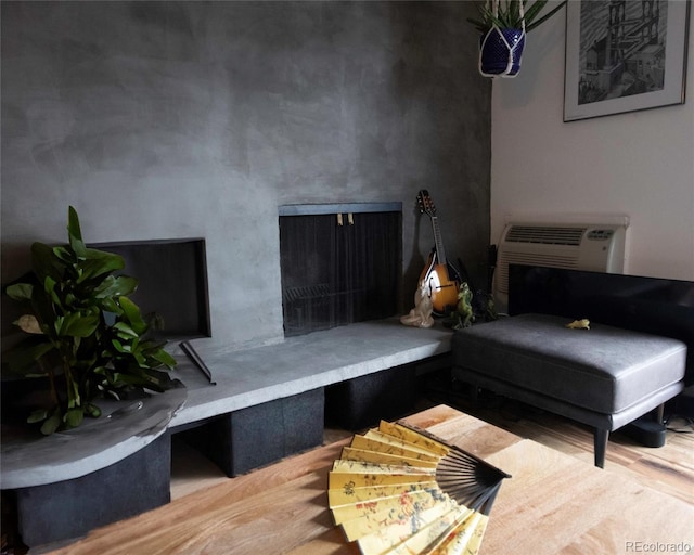 4110 Hale Pkwy Unit 5G, Denver, CO 80220 - living area featuring wood finished floors and an AC wall unit