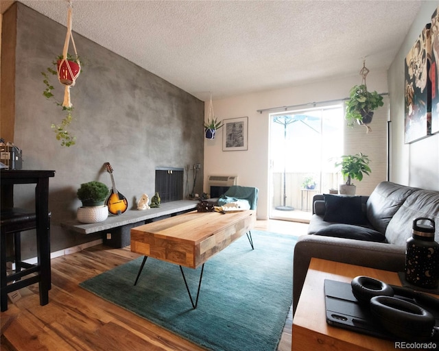 4110 Hale Pkwy Unit 5G, Denver, CO 80220 - living area featuring wood finished floors and a textured ceiling