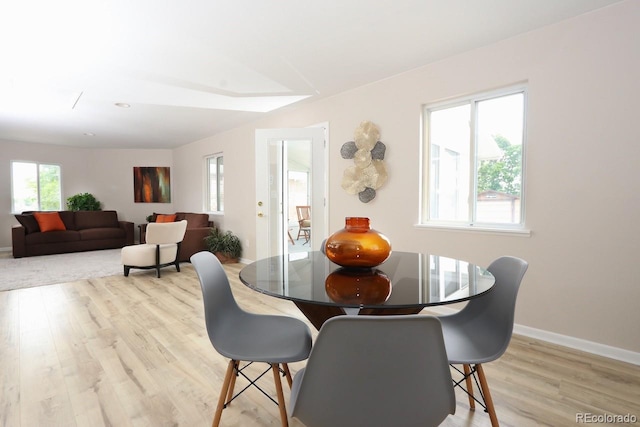 10420 Marion St, Northglenn, CO 80233 - dining space featuring light wood-style floors and baseboards