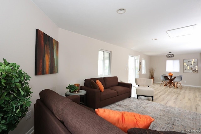 10420 Marion St, Northglenn, CO 80233 - living area with wood finished floors and baseboards
