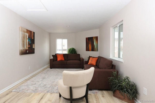 10420 Marion St, Northglenn, CO 80233 - living room featuring light wood-type flooring and baseboards