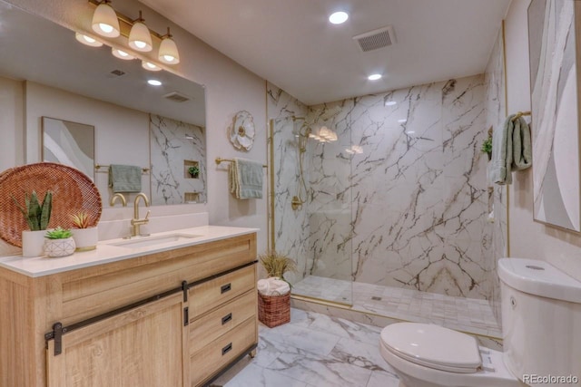 10420 Marion St, Northglenn, CO 80233 - bathroom featuring toilet, marble finish flooring, a marble finish shower, recessed lighting, and vanity