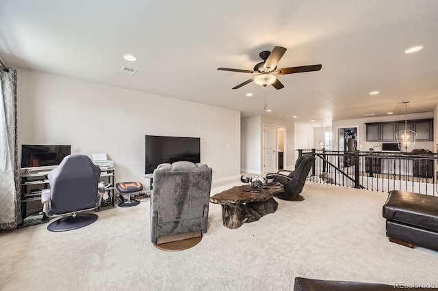 living room featuring recessed lighting, a ceiling fan, carpet, and visible vents