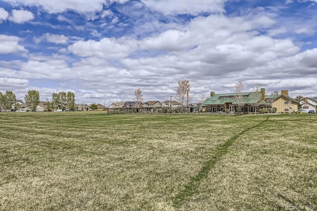 view of yard featuring a residential view