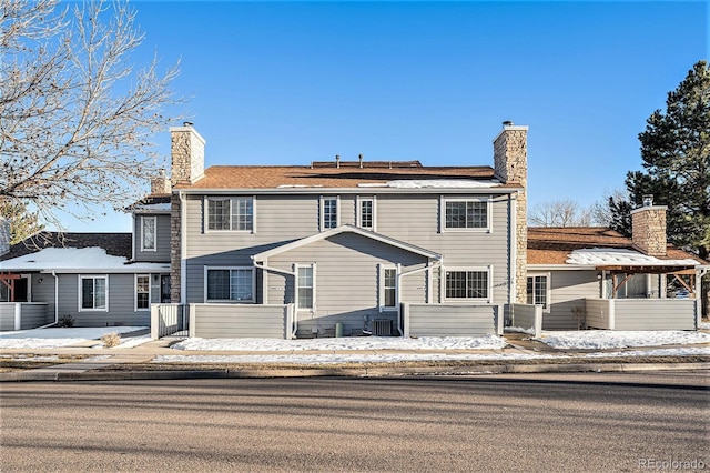 view of snow covered property