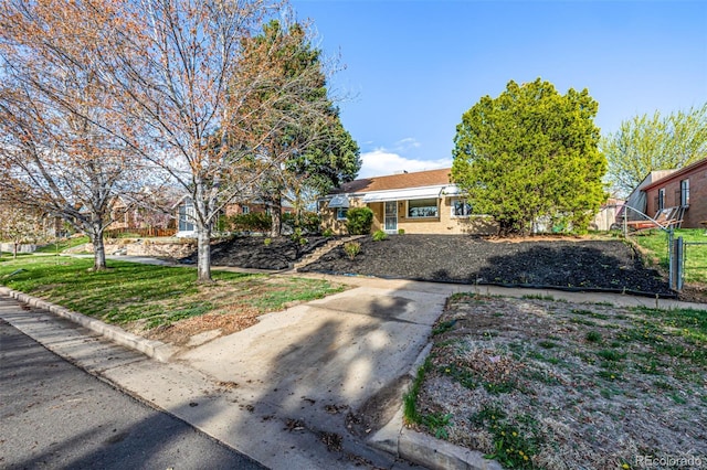view of front of house with fence